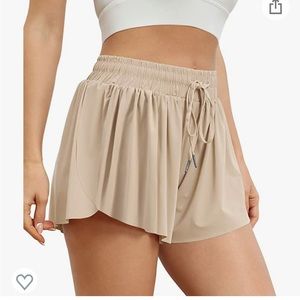NWT tan flowy running shorts